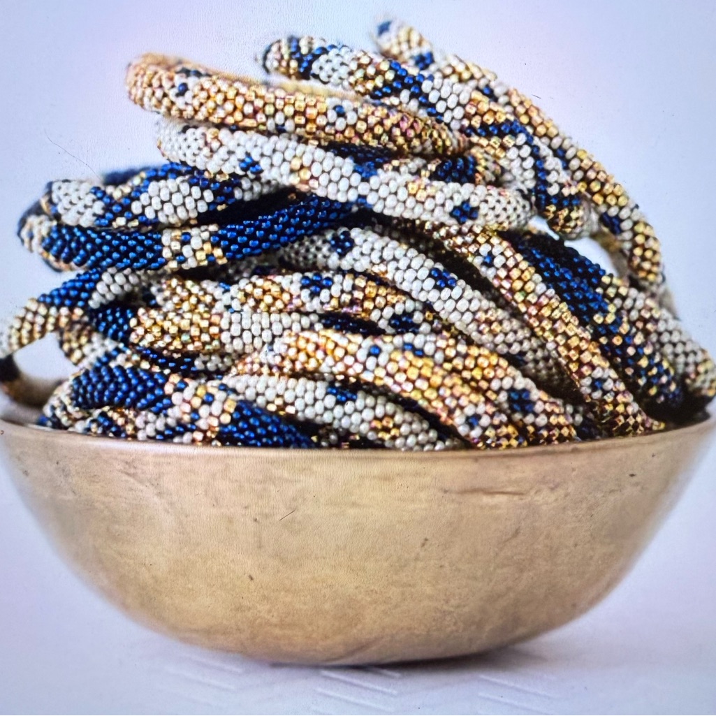 Brand New Set Of 4 Aid Through Trade The Original Roll On Bracelet